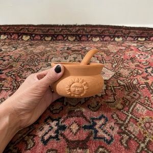 Clay bowl with spoon